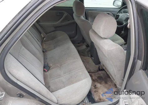 2000 Toyota Camry Le z USA, uszkodzony, nr VIN 4T1BG22KXYU651909